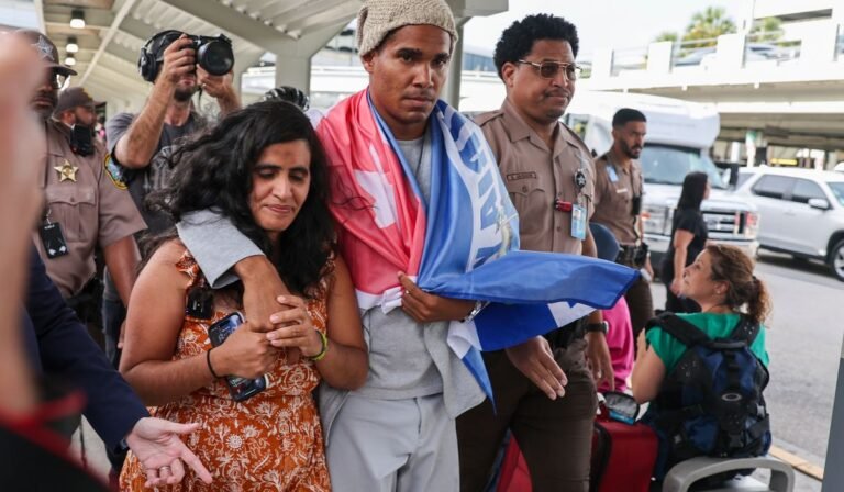 Cuban artist and dissident exiled from country after 5 years in prison arrives in U.S.