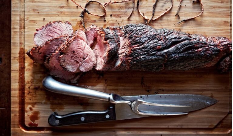 This smoky, fire-kissed beef tenderloin with herb butter comes from Canal House